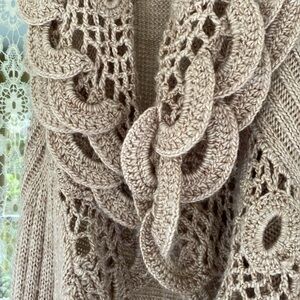 Long beige knitted vest, open front. Flows beautifully off shoulders.